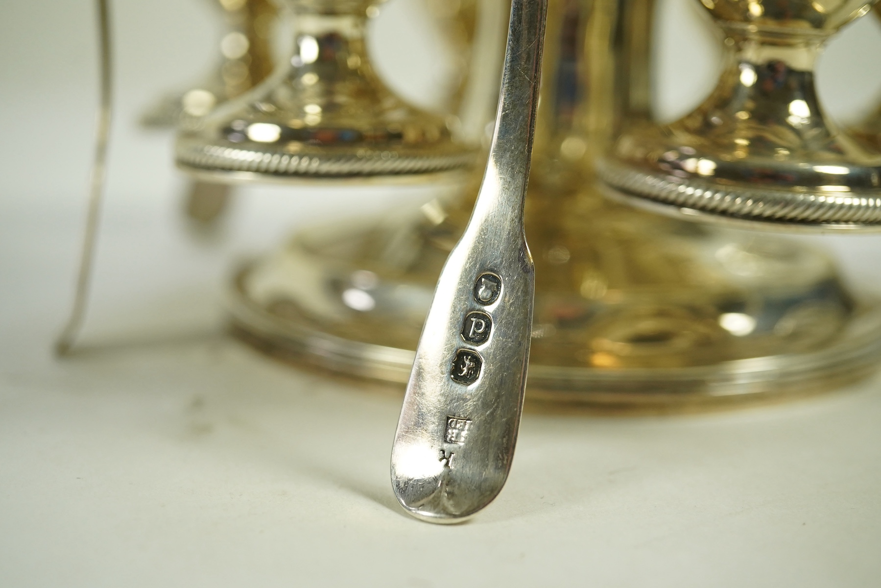 A George III silver egg cruet stand, with six egg cups and six spoons (one not matching), by Solomon Royes & John East Dix